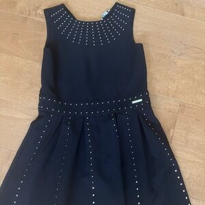 Marciano black flare dress with gold accents